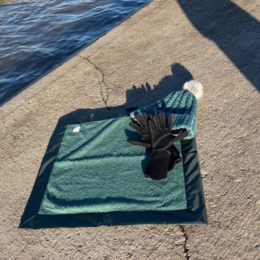 Wild swim mat for changing after watersports