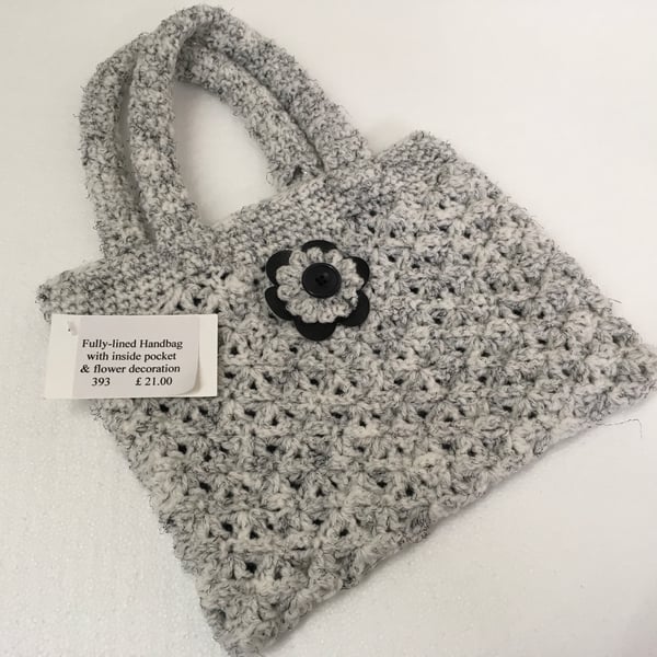 Selection of 4 Crocheted Bags. Different styles using Grey Fleck, Aran yarn.