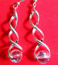 Sparkly Chrystal globe earrings on a twisted silver fitting - Christmas gift - Image 1