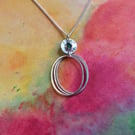Circles Silver Pendant with 4mm Green Cubic Zirconia, Sterling Silver Chain