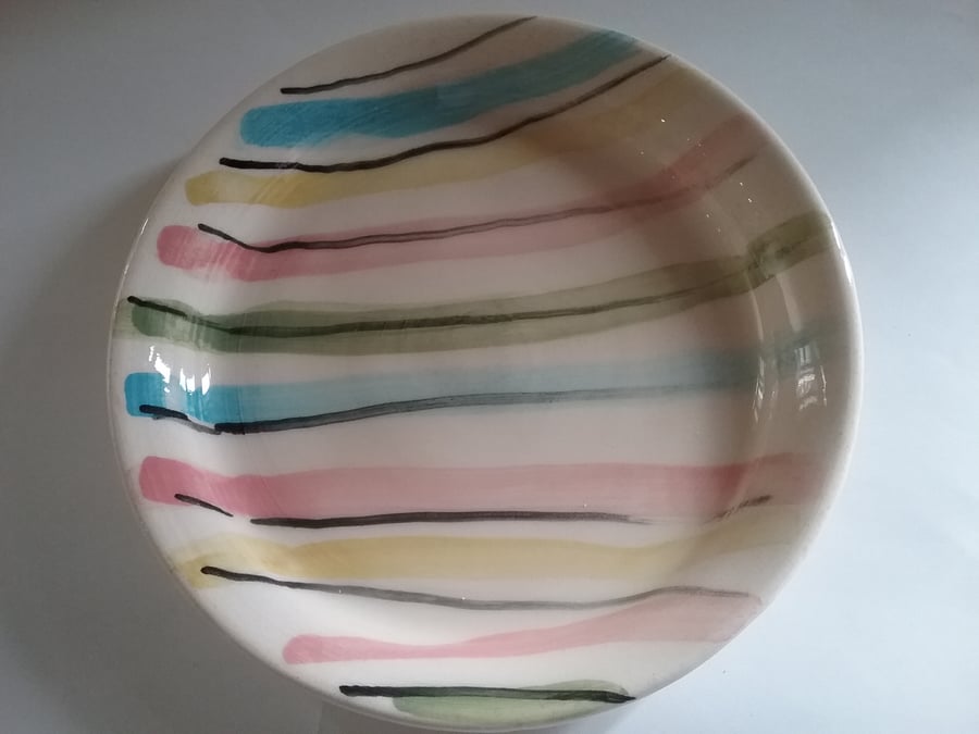 Ceramic pottery hand-thrown small hand painted striped plate.