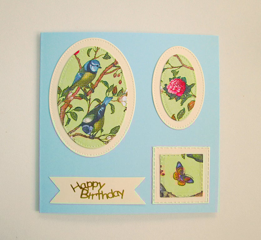 Blue tits and butterfly floral birthday card