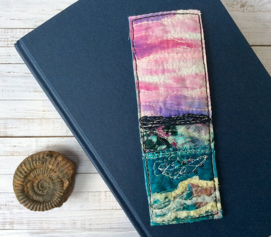 Embroidered up-cycled sunset seascape bookmark. 