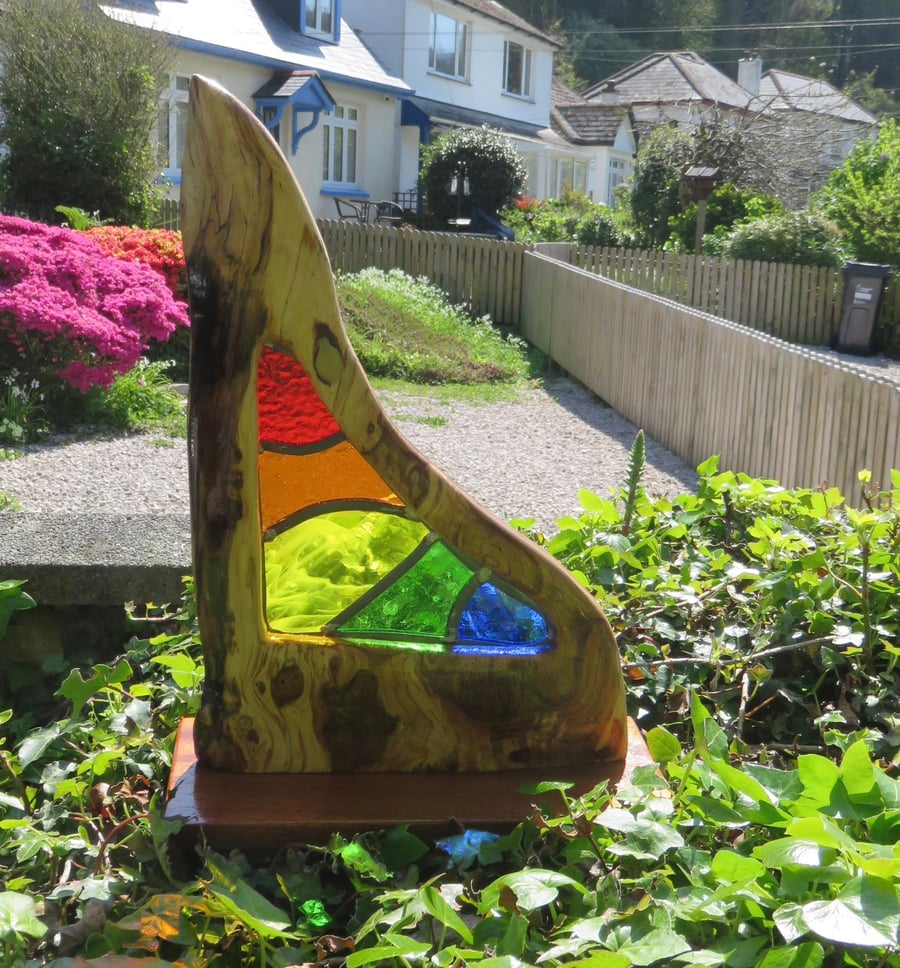 This is Parvos. A unique handmade stained glass and wood sculpture. 