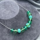 green lampwork glass beaded necklace