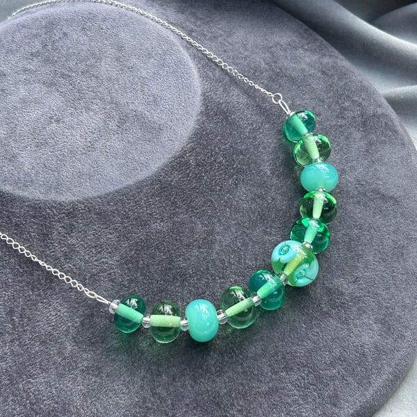 Green and Brown Swirled Lampwork and Wood Bead Necklace Sterling Silver Adjustable - Made in the USA Green and Brown Swirled Lampwork and Wood Bead Necklace Sterling Silver Adjustable - Made in the USA