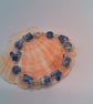 Bracelet and Earring Set Made with White Ceramic Beads with Blue Pattern - Image 7