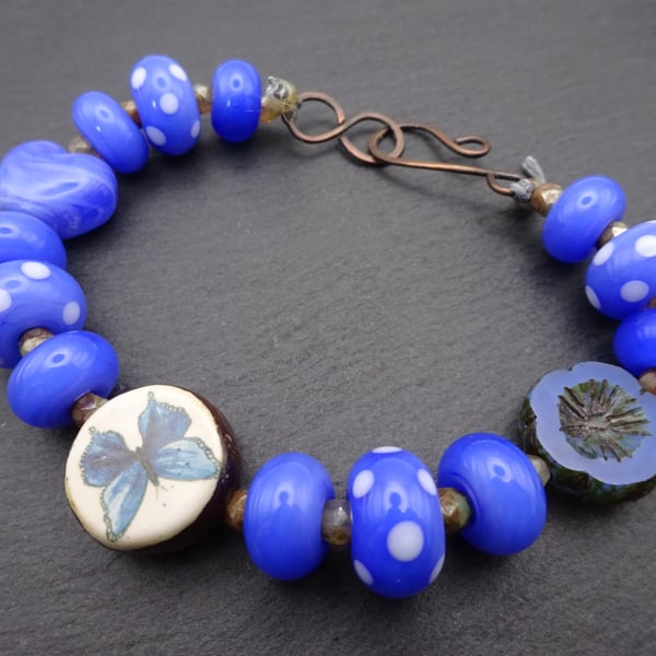blue butterfly lampwork glass beaded bracelet