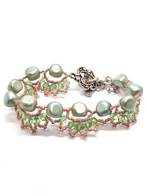 Shimmering peach and green contemporary bracelet