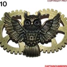 Bronze owl on bronze cogs DC10