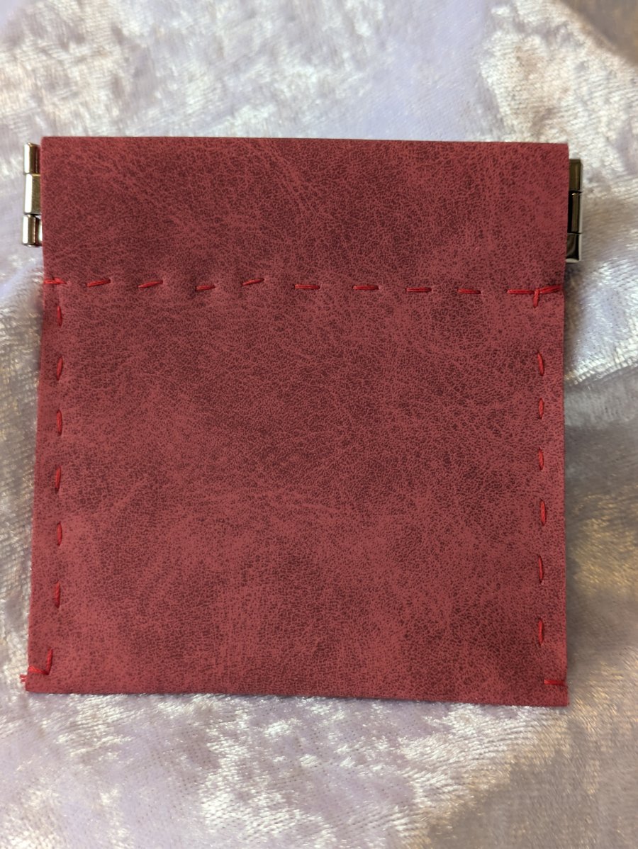 Red suede effect coin purse.