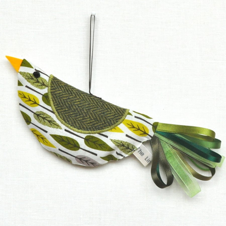 Lavender Bird in Green Leaves