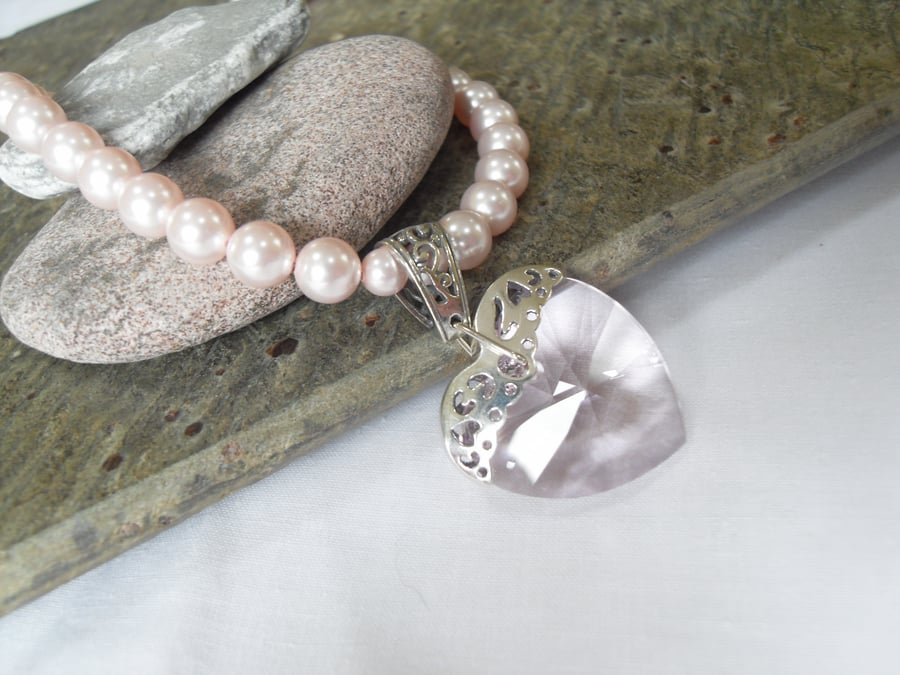 Crystal heart pendant and pearl necklace
