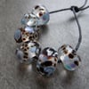 lampwork glass beads, blue and brown frit set