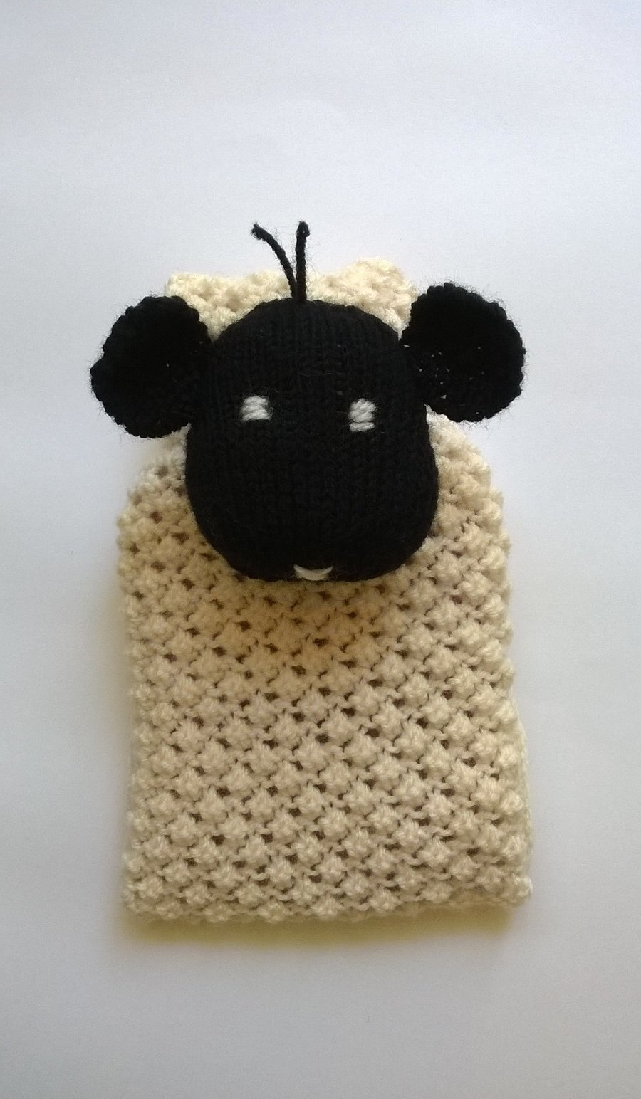 Knitted sheep hot water bottle