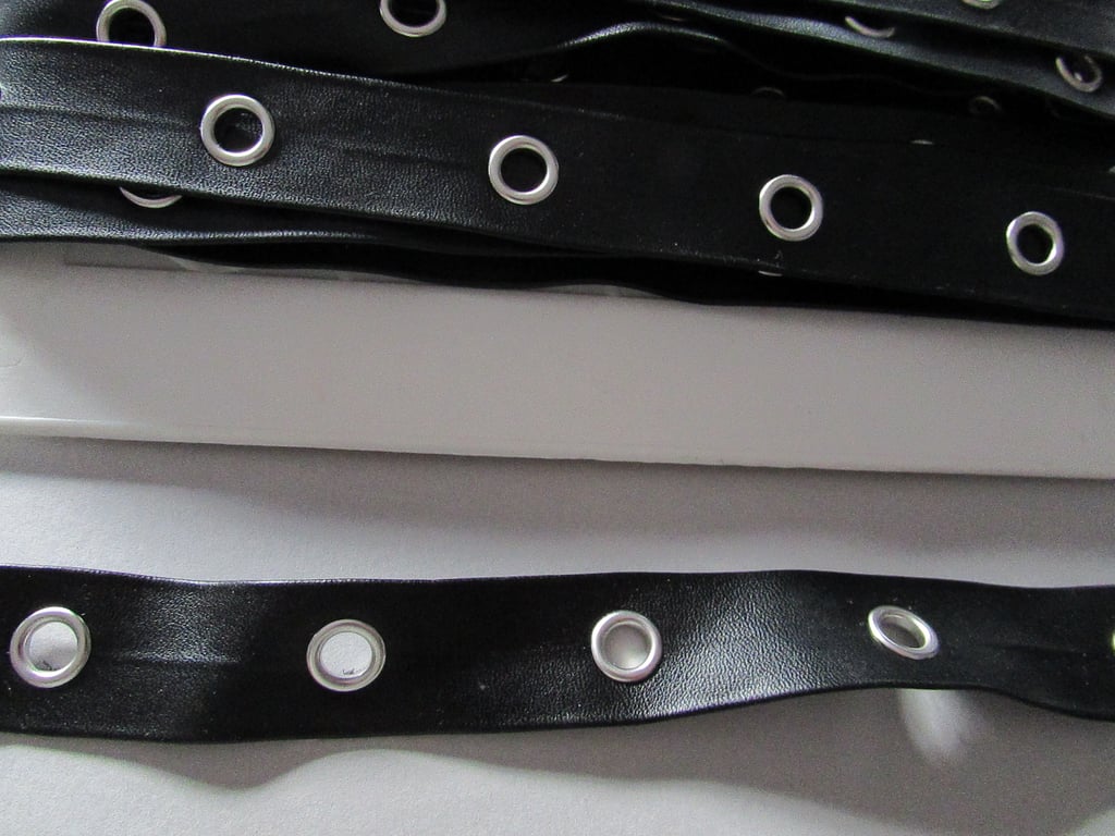 BLACK PLEATHER EYELET TAPE SOLD BY THE METRE