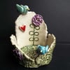 ceramic tea light holder with bird, heart and flowers