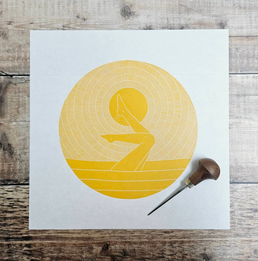 Sunshine- Original linocut print of a pair of legs sticking up out of the sea