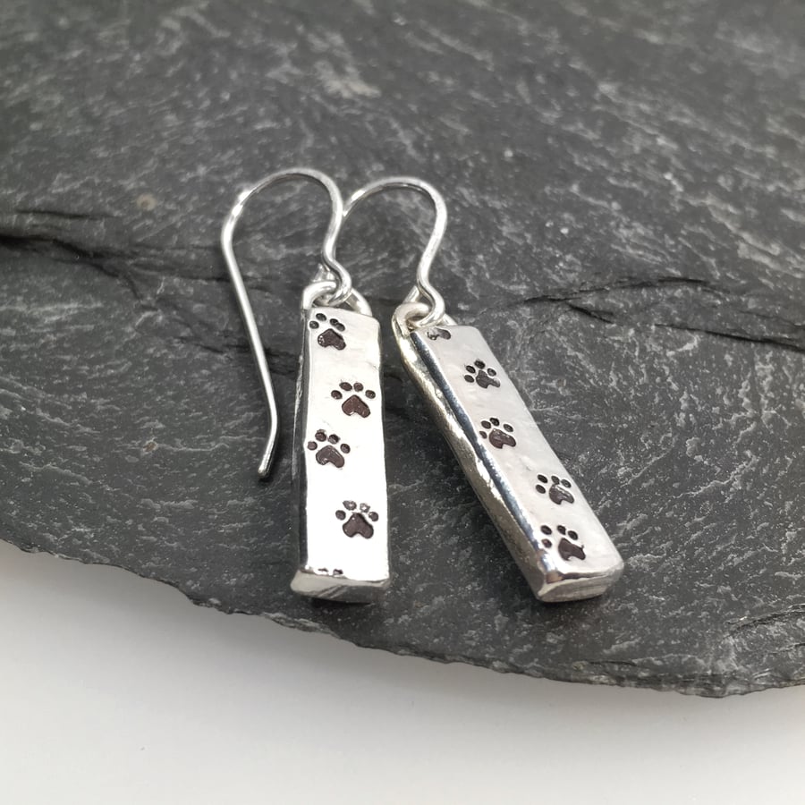 Sterling silver paw print drop earrings