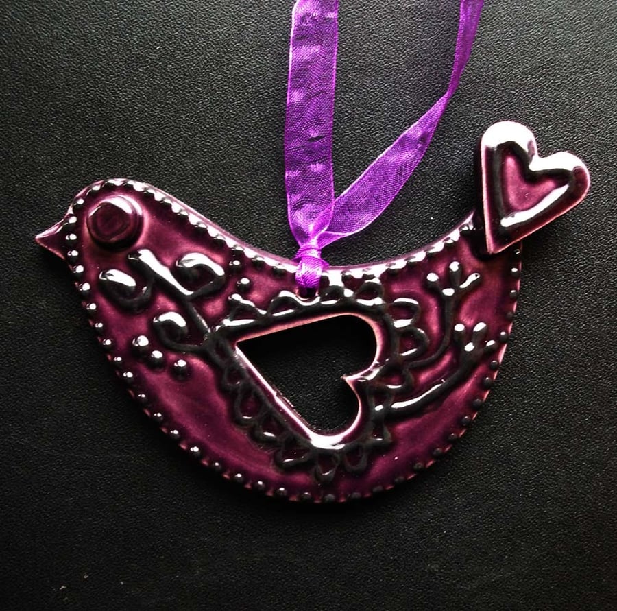 ceramic folk art  purple bird decoration 