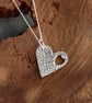 Silver heart within a heart pendant - Image 1