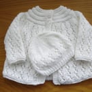 Hand Knitted Baby Jacket And Hat In A White Sparkle Yarn (AJ52)