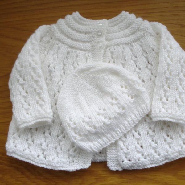 Hand Knitted Baby Jacket And Hat In A White Sparkle Yarn (AJ52)