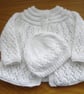 Hand Knitted Baby Jacket And Hat In A White Sparkle Yarn (AJ52)