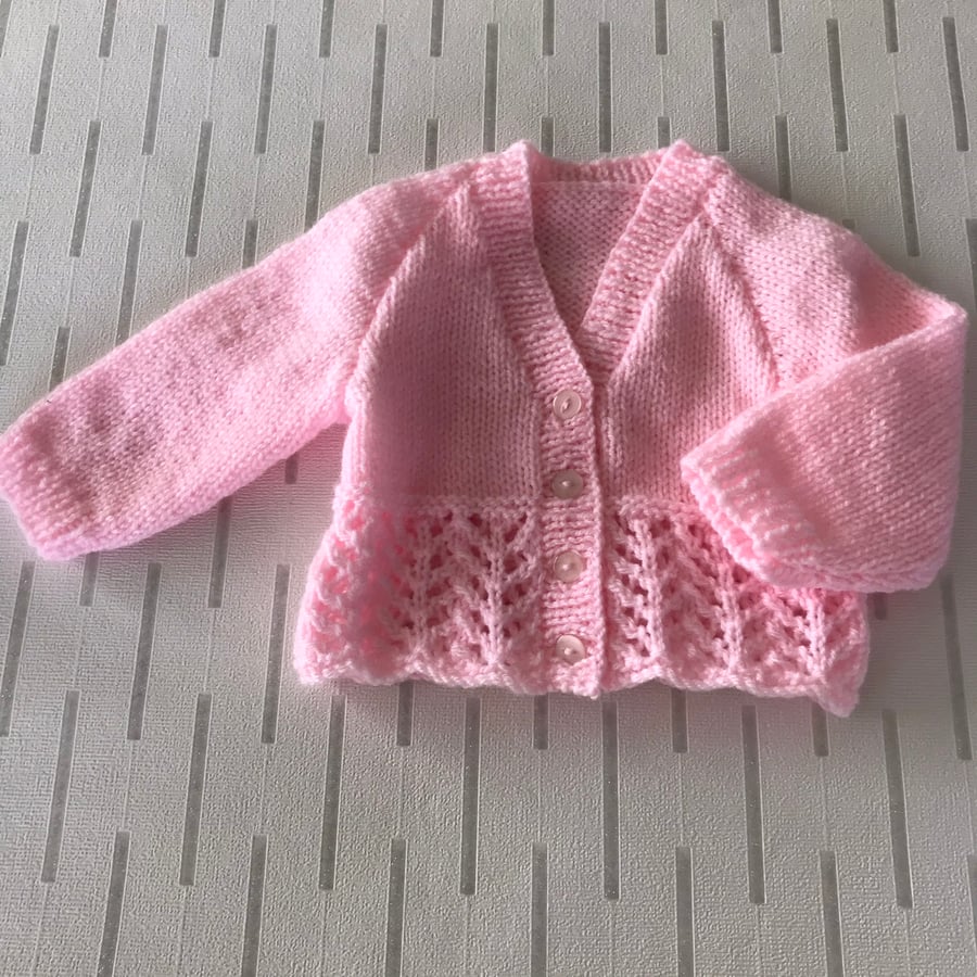 Pink cardigan with patterned border