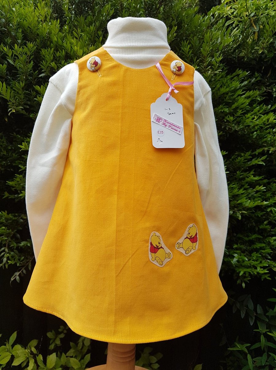 Age: 1-2y. Yellow baby needlecord pinafore dress. 