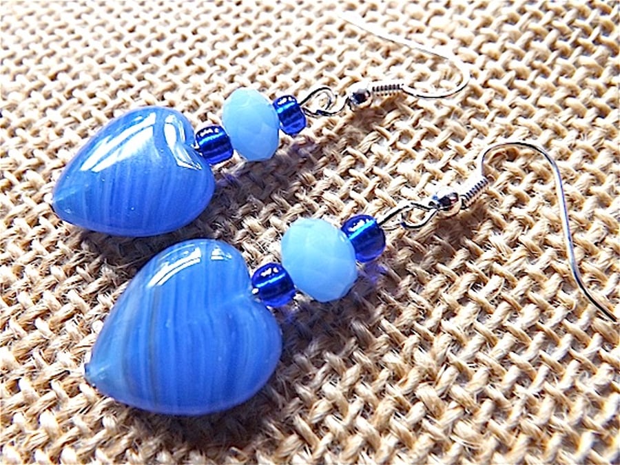  Dangle earrings for pierced ears with blue heart lampwork glass .