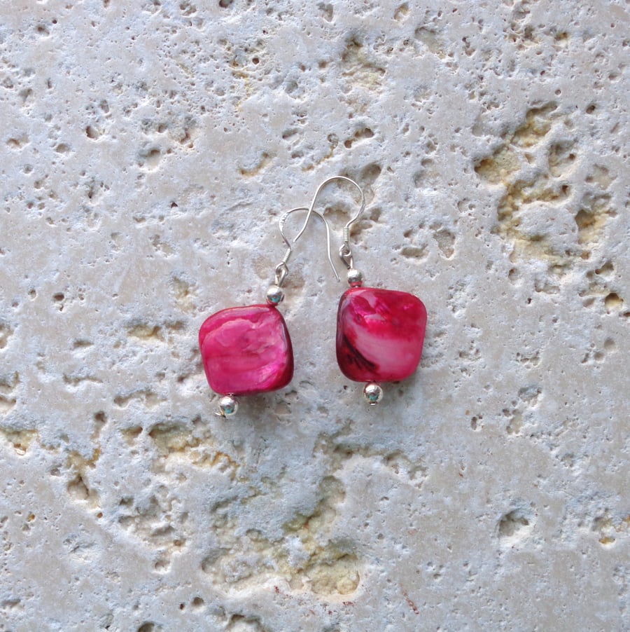 Dark pink shell earrings