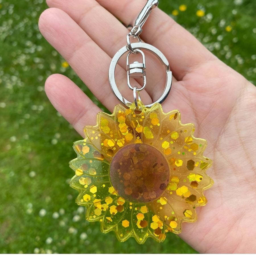 Sunflower golden yellow semi transparent sparkly key ring.