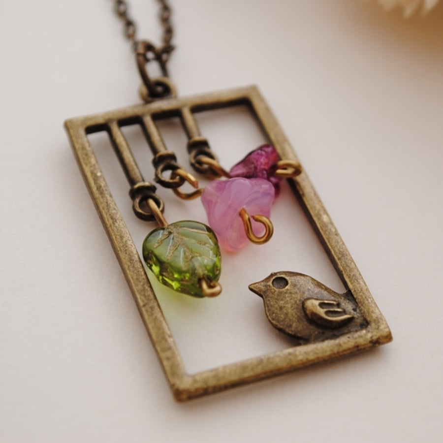 Bird necklace with flowers