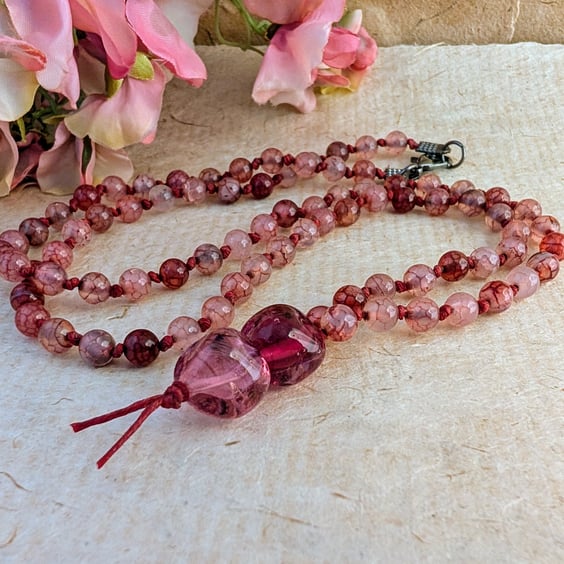 Pink dragon vein agate knotted cord necklace with lamp work bead pendant 