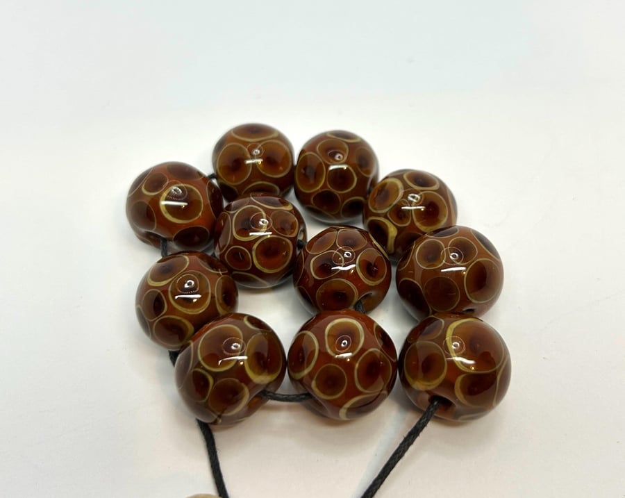 Handmade brown spotted lamp work glass beads