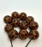 Handmade brown spotted lamp work glass beads - Image 1