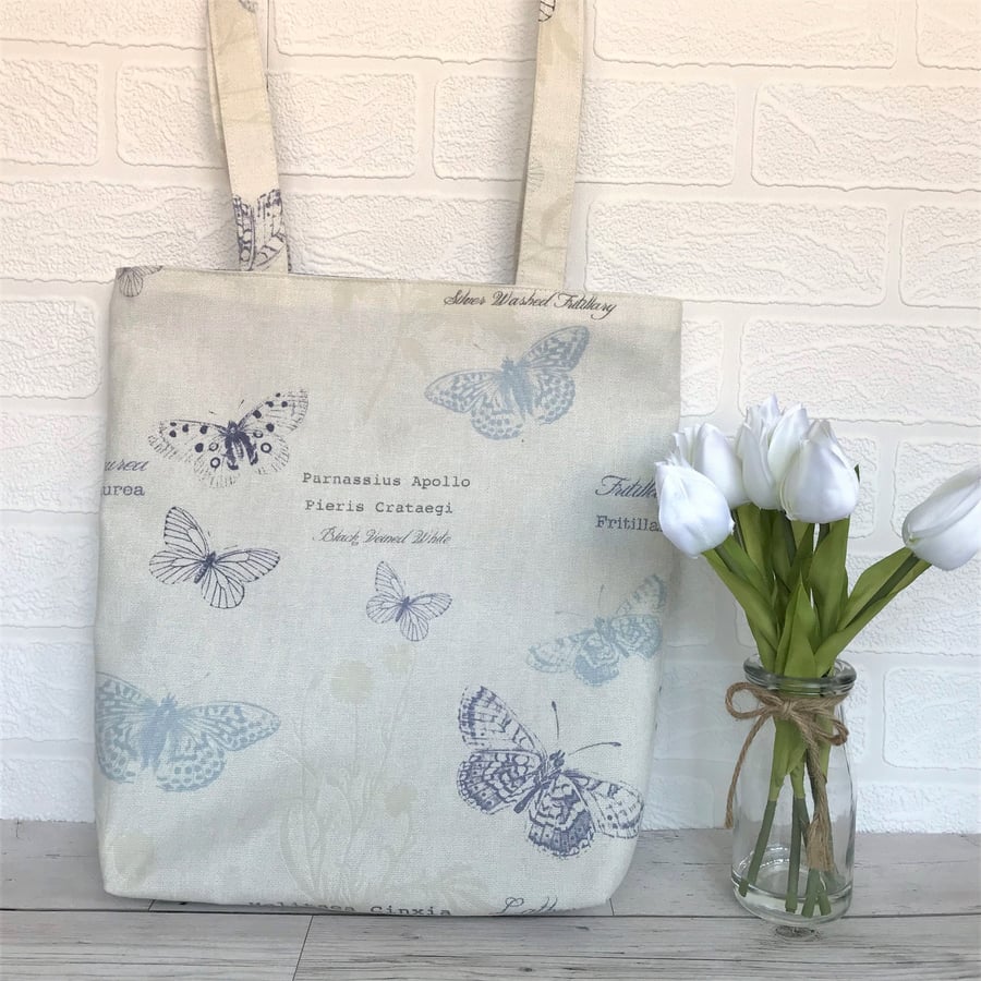 Butterflies tote bag in cream with blue butterflies