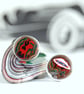 Round Kenworth fordite cufflinks  - Image 1