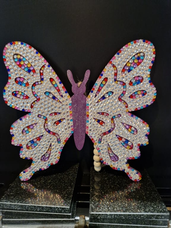 Sequinned wooden butterfly. 
