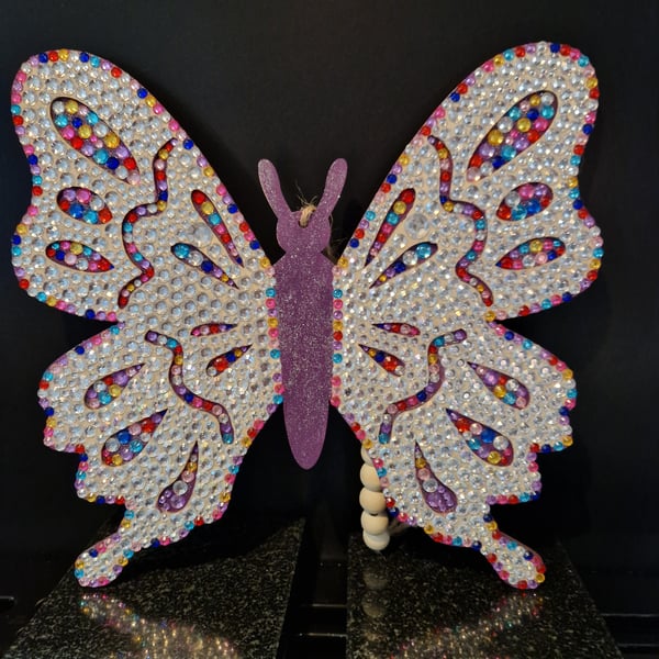 Sequinned wooden butterfly. 