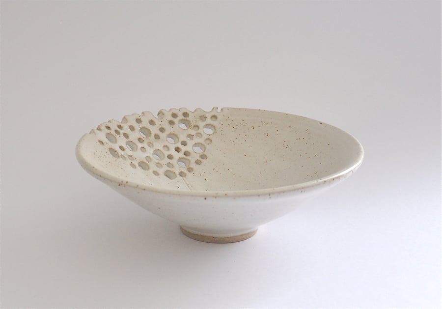 Decorative cream-coloured ceramic bowl with carved flower - handmade pottery