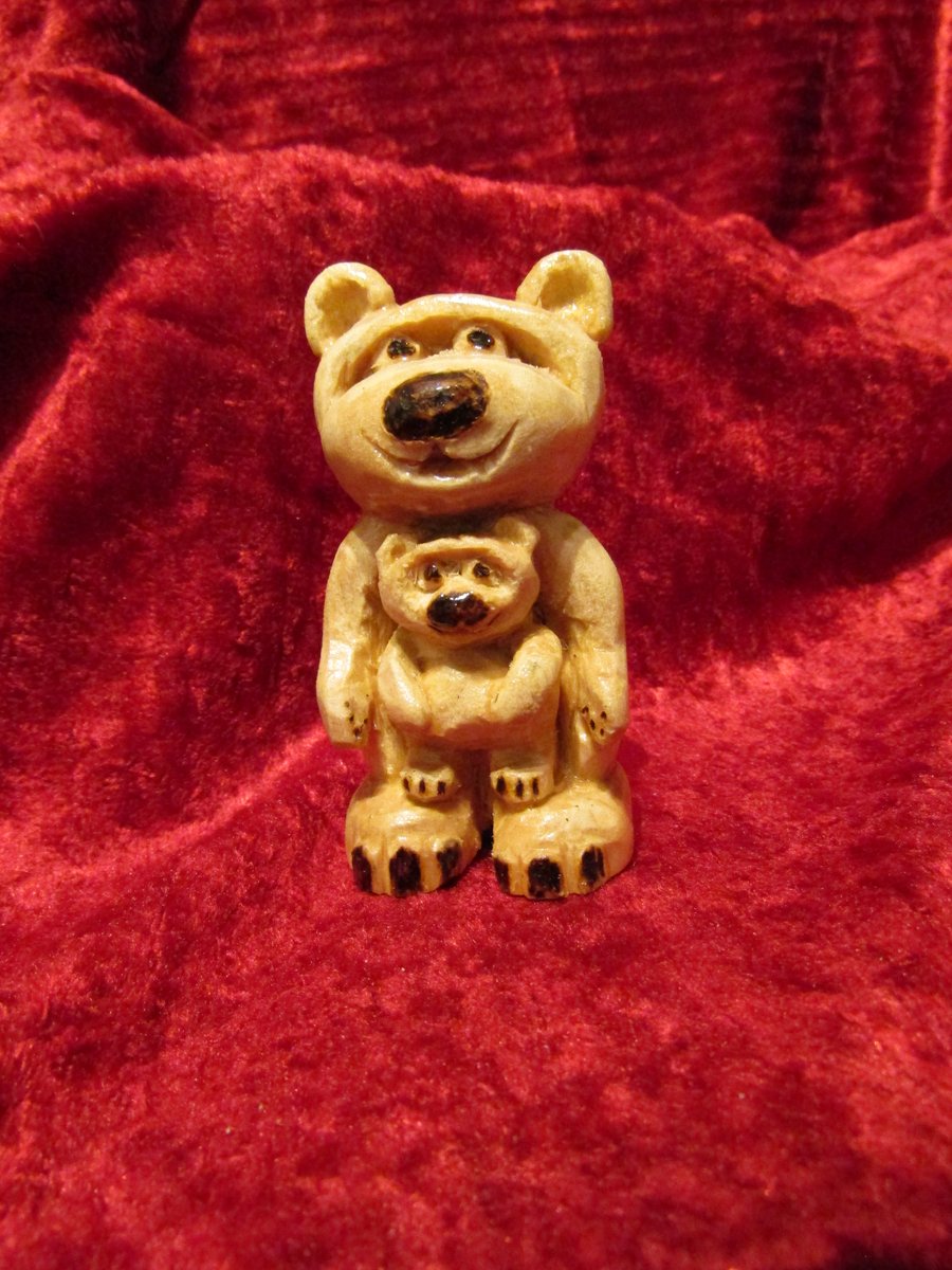 Whittled, cute mother and baby bear