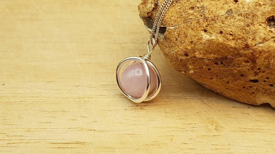 Pink Kunzite circle pendant necklace. Sterling silver