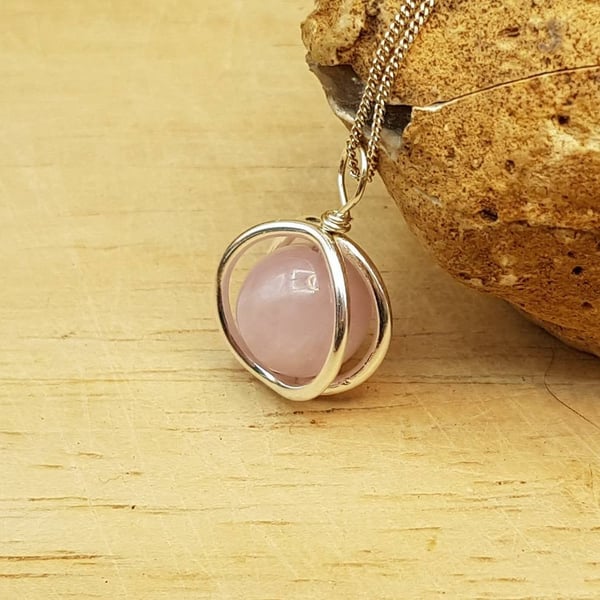 Pink Kunzite circle pendant necklace. Sterling silver