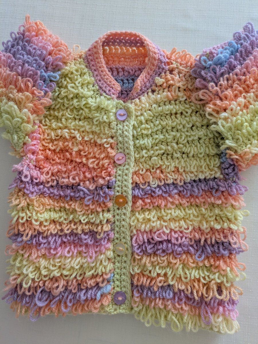 Multi coloured loopy cardigan for a one year old little one 