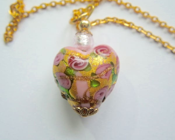 Pink and gold Murano glass heart pendant with gold chain.