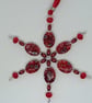 Red Snowflake Hanging Decoration - Image 1