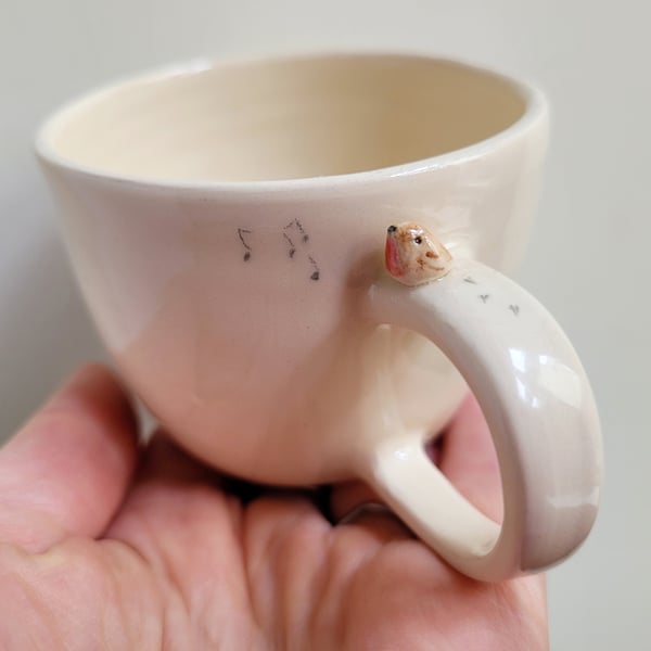 Handthrown ceramic robin espresso cup with tiny bird & footprints gardeners gift