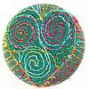 One inch badge